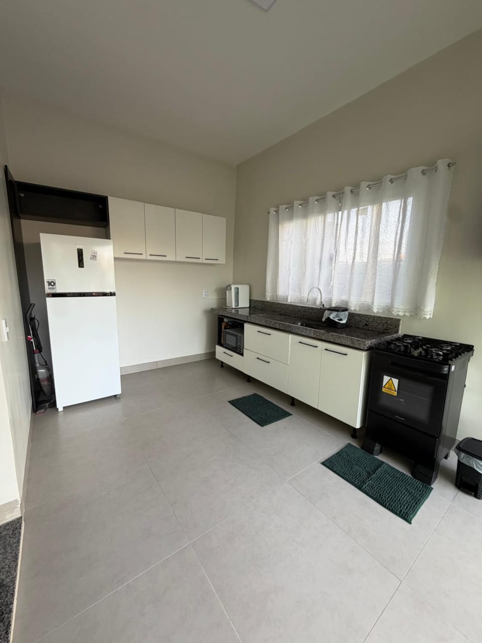 Kitchen or kitchenette, oven, stove