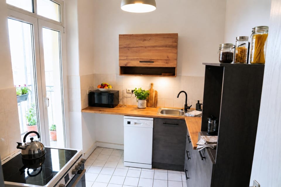 Kitchen or kitchenette, dishwasher, microwave, oven, stove, kitchen