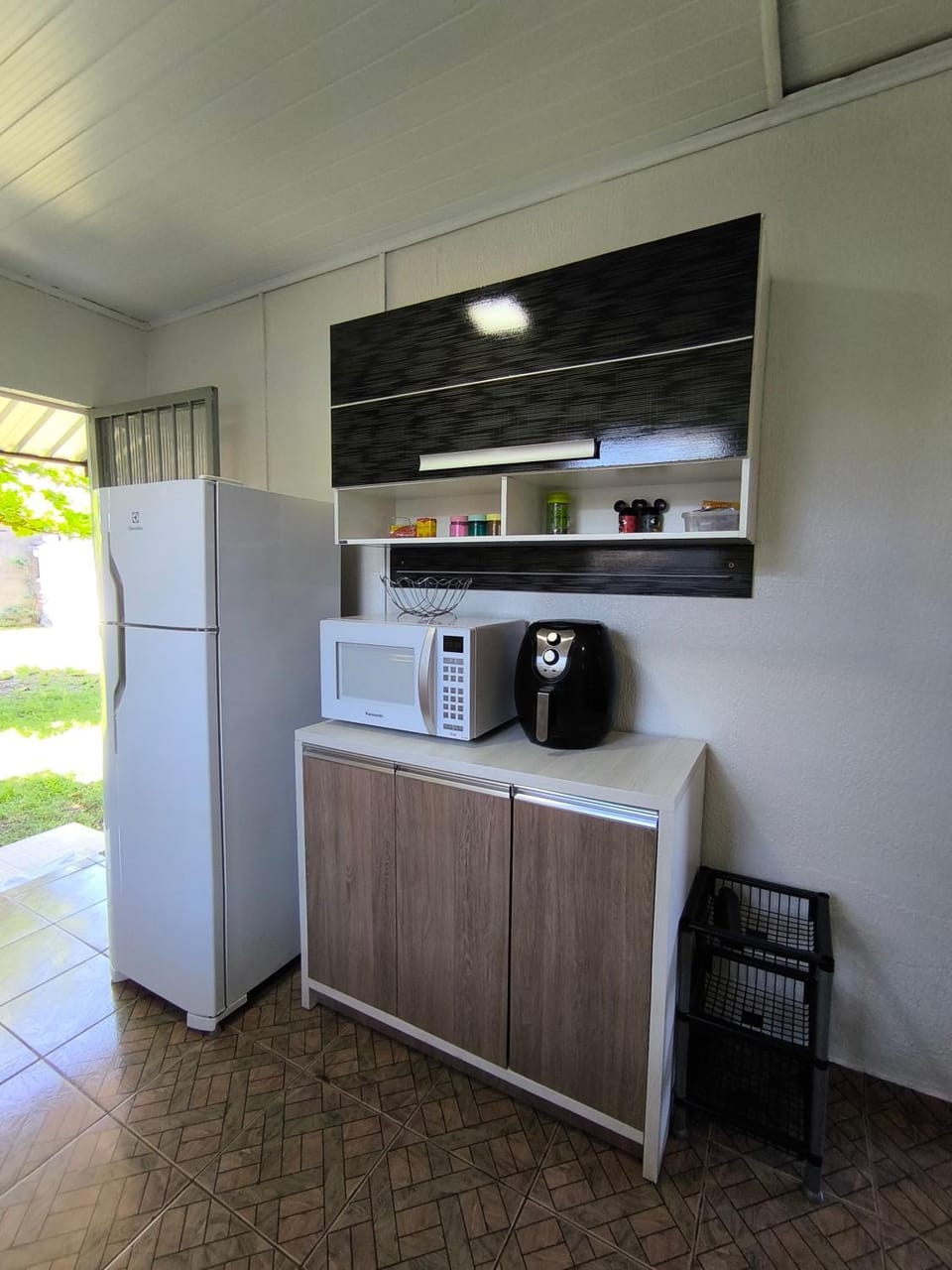 Kitchen or kitchenette, microwave