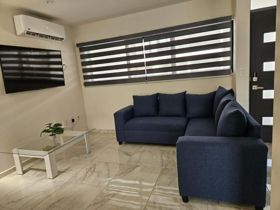 Communal lounge/ TV room, TV and multimedia, Living room, Seating area, Evening entertainment, air conditioner
