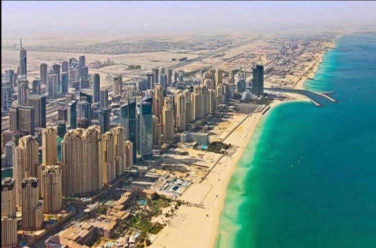 Property building, Nearby landmark, Day, Natural landscape, Bird's eye view, Beach, City view, Sea view