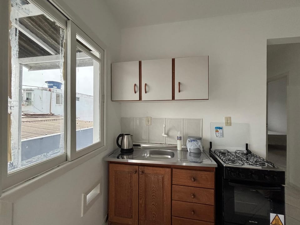Kitchen or kitchenette, stove