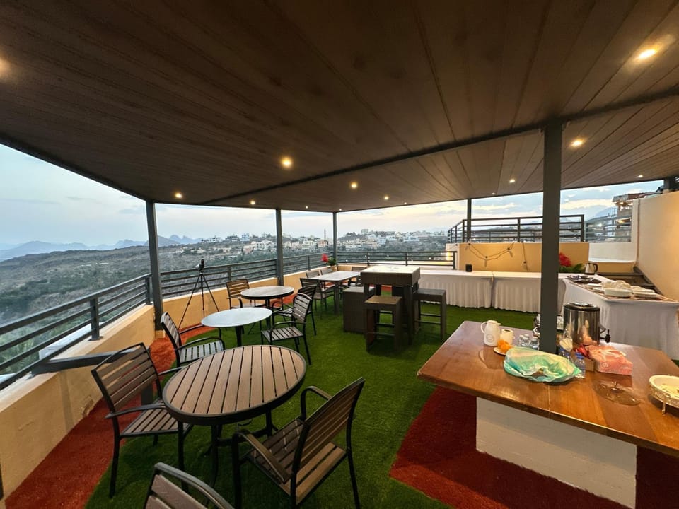Restaurant/places to eat, Natural landscape, View (from property/room), Seating area, Dining area, Food