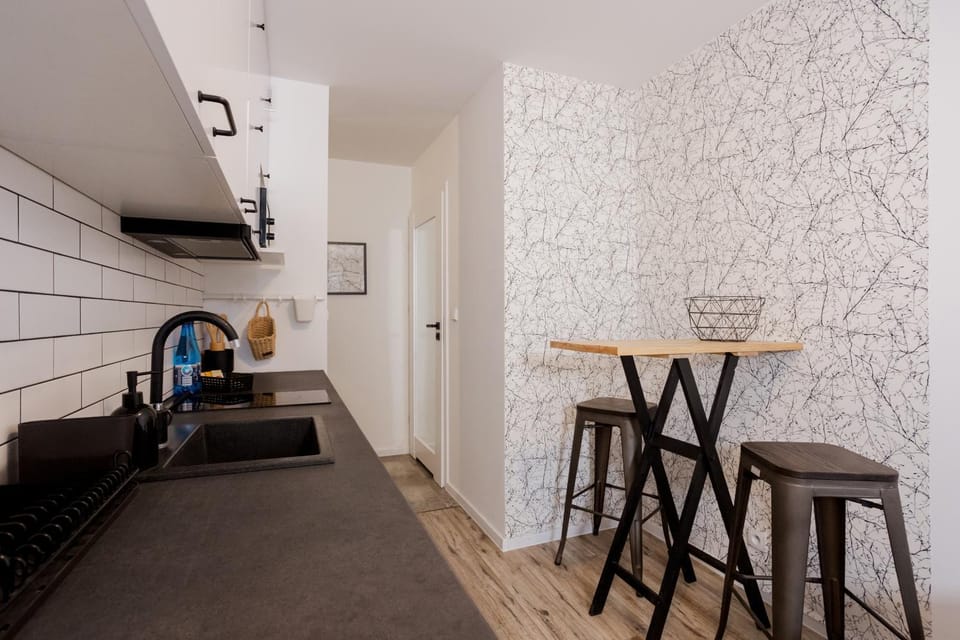 Kitchen or kitchenette, Living room, Seating area, Dining area