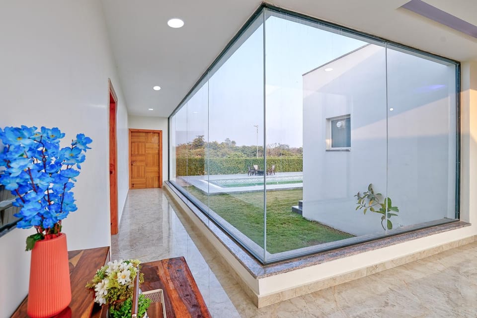 Alaya Stays Amaltas 4 BHK Countryside Hideaway With Pvt Pool, Lush Garden & 360 Aravali Views Villa in Gurugram