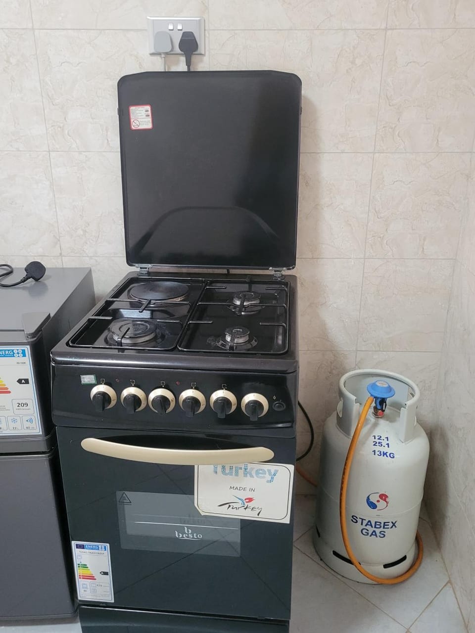 Kitchen or kitchenette, stove