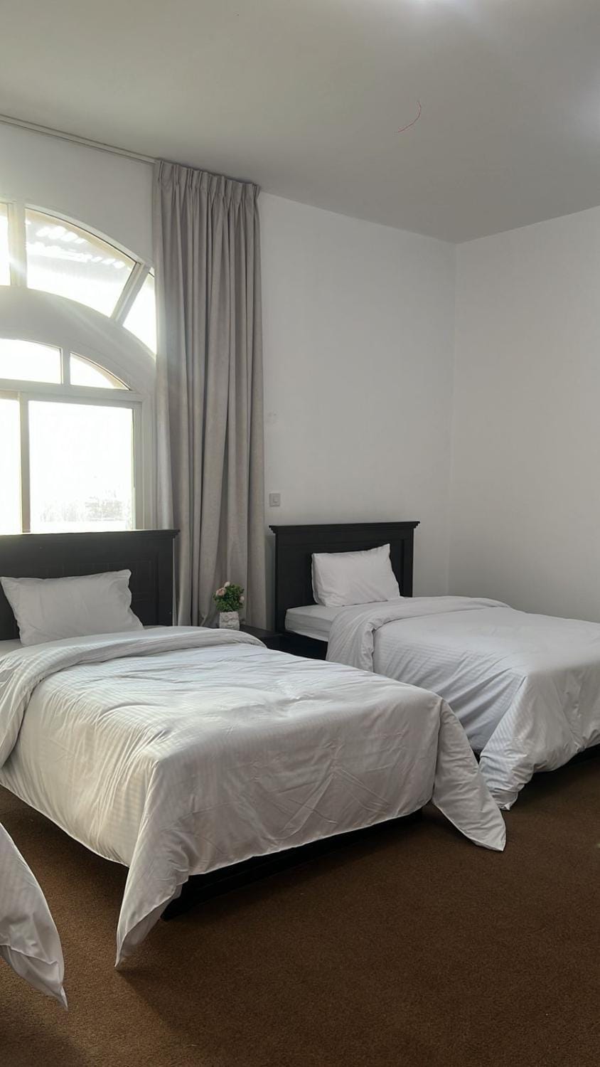 Triple Room with 3 Single Beds A1 Vacation rental in Abu Dhabi