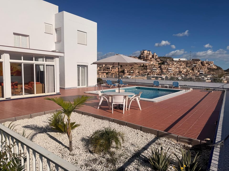 Patio, Pool view, sunbed
