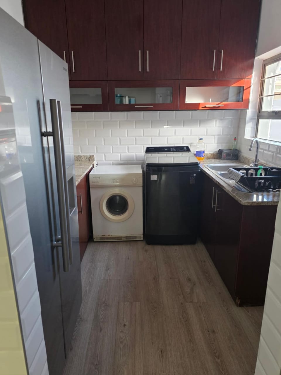 Kitchen or kitchenette, washing machine, dryer