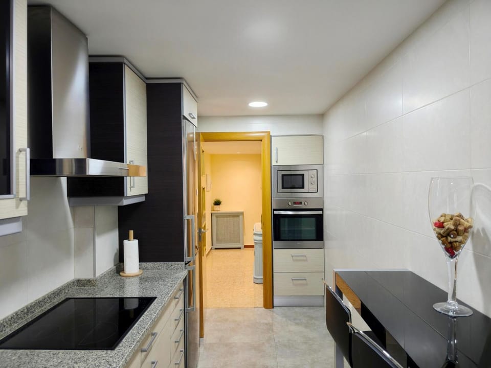 Kitchen or kitchenette, oven, stove