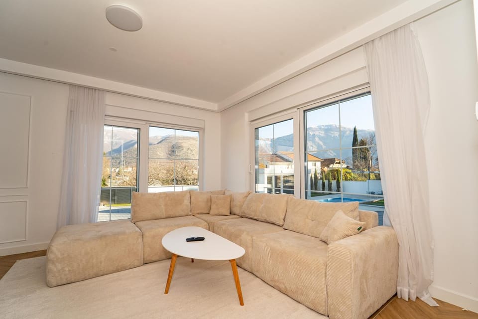 View (from property/room), Living room, Seating area, Pool view