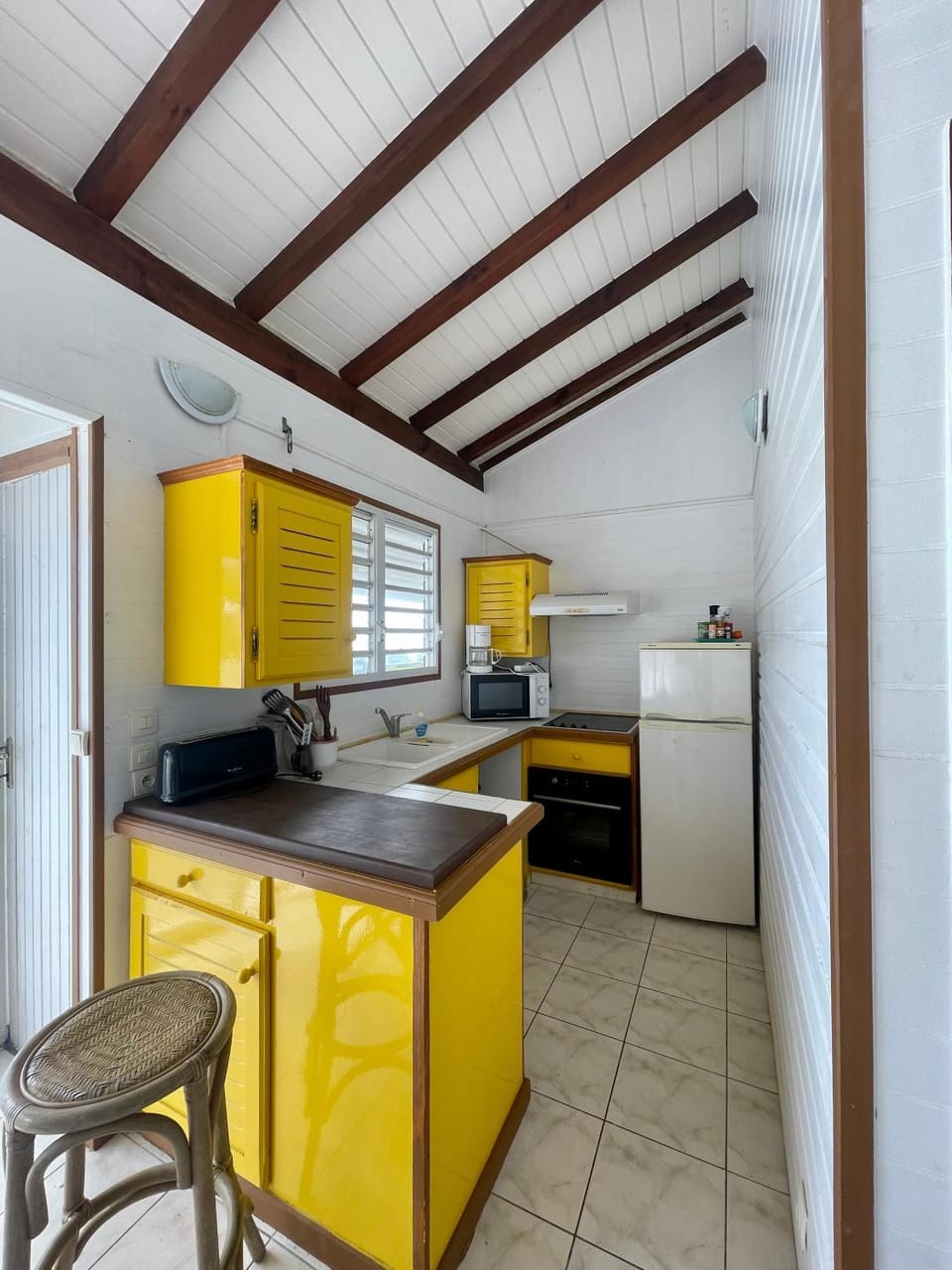 Kitchen or kitchenette, oven, stove, toaster