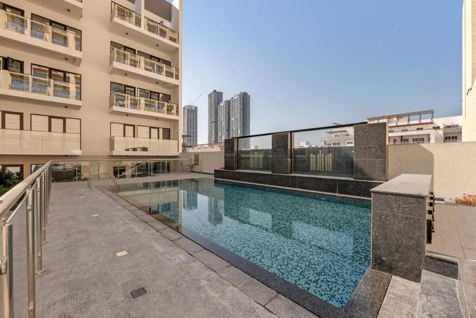 Waves - Modern Comfort in JVC - Elegant 1BR Stay Apartment in Dubai