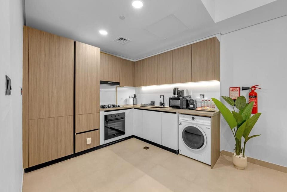 Waves - Modern Comfort in JVC - Elegant 1BR Stay Apartment in Dubai