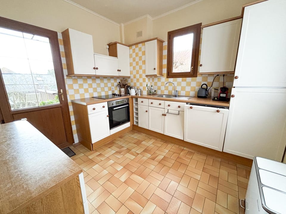 Kitchen or kitchenette, dishwasher, oven, stove, toaster