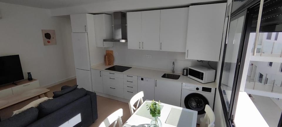 Kitchen or kitchenette, Living room, Dining area, dishwasher, stove, washing machine