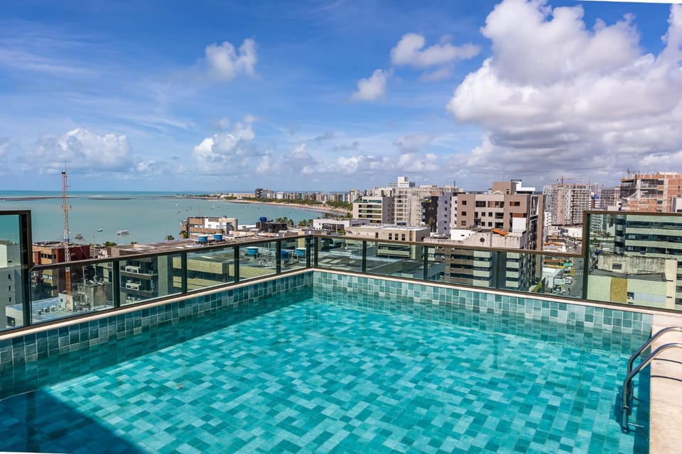 Property building, Patio, Day, Natural landscape, View (from property/room), Balcony/Terrace, City view, Pool view, Sea view, Swimming pool, sunbed
