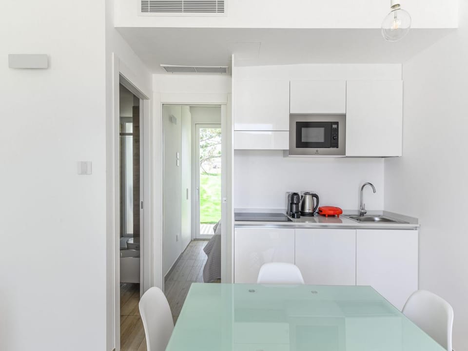 Dining area, microwave, oven, kitchen