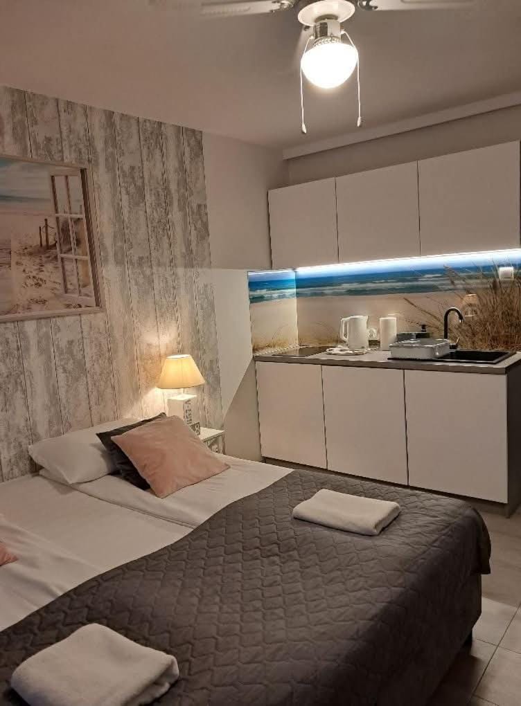Apartament LAVENDER 14 - łoże typu Queen, balkon i własny taras Apartment in Pomeranian Voivodeship