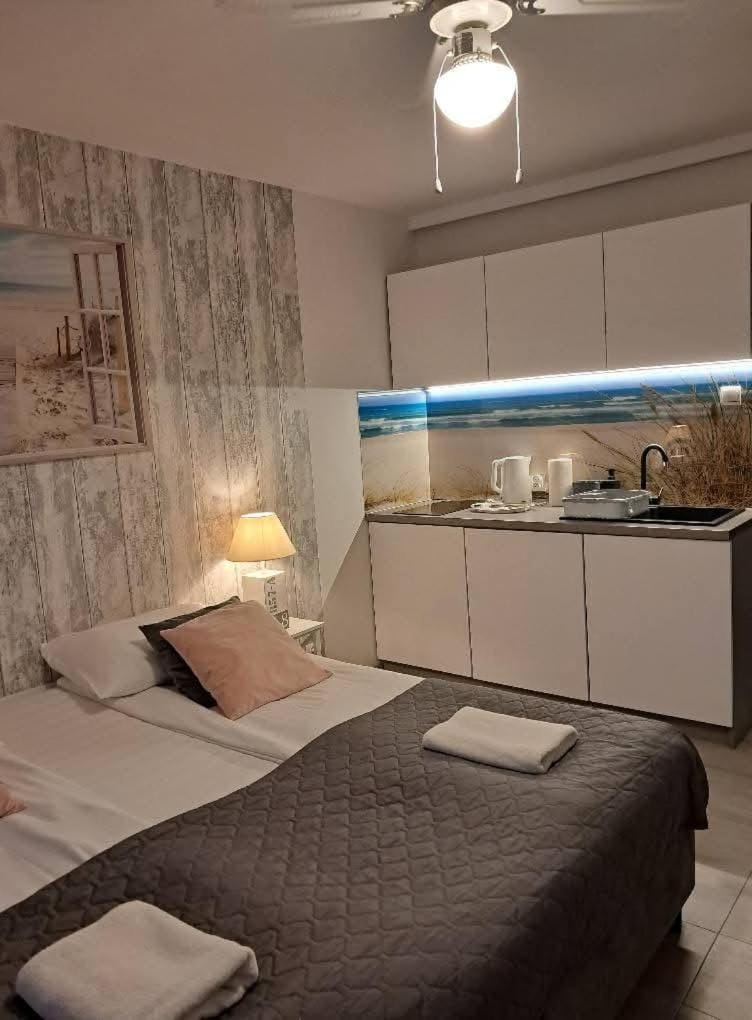 Apartament LAVENDER 14 - łoże typu Queen, balkon i własny taras Apartment in Pomeranian Voivodeship