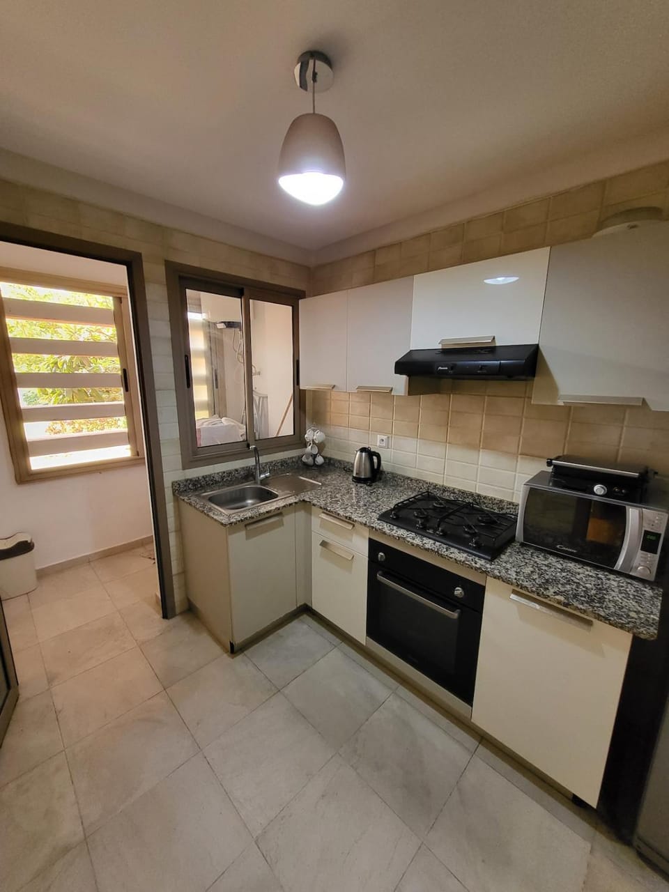 Kitchen or kitchenette, oven, stove