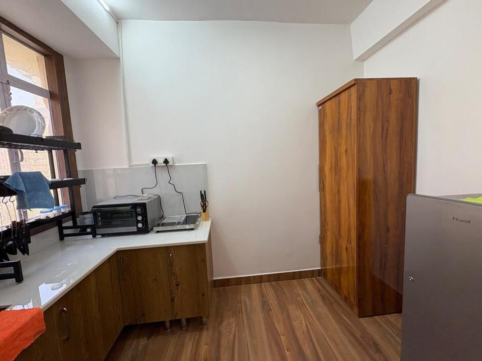 Kitchen or kitchenette, microwave, oven, storage, stove, kitchen, kitchen