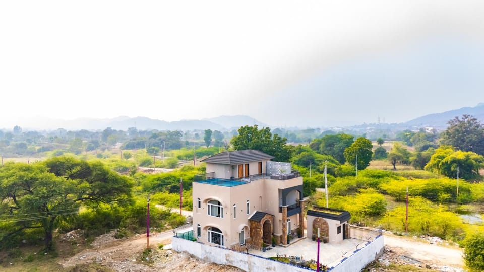 Vaikunth Villa 3-BHK Getaway with Rooftop Pool, Sit-out Area, Jacuzzi, Scenic Lake & Hill Views Villa in Gujarat