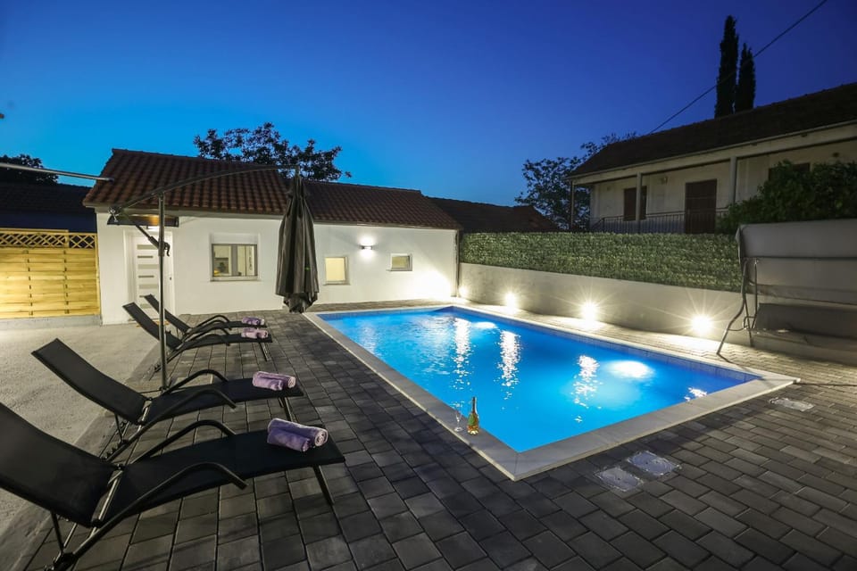 Property building, Night, Swimming pool