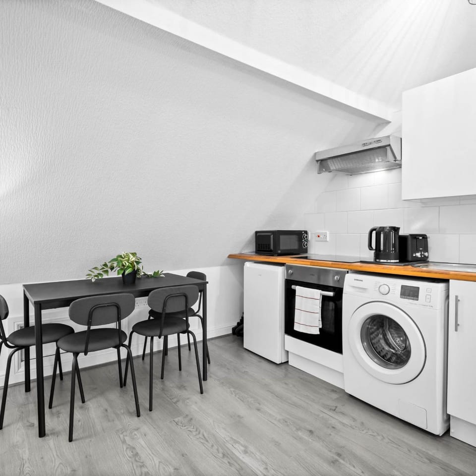 Kitchen or kitchenette, Decorative detail, Dining area, microwave, toaster, washing machine