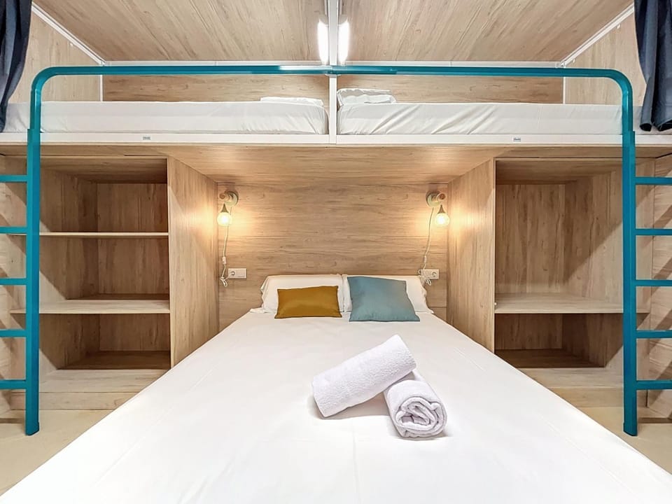 Bed, bunk bed, towels, wardrobe