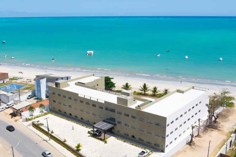 Property building, Natural landscape, Bird's eye view, Beach, Sea view, Parking