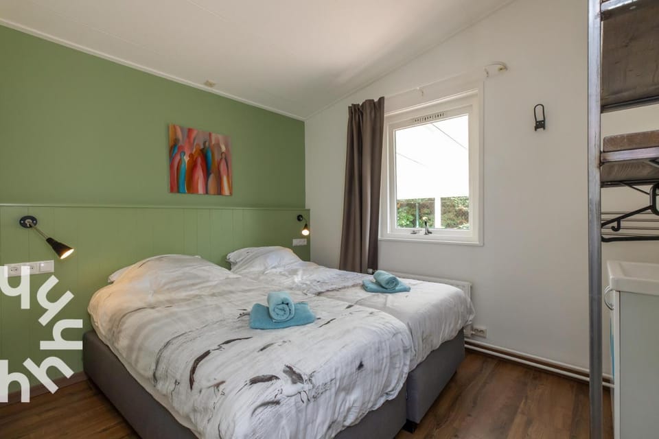Sfeervolle vakantiewoning met grote tuin vlakbij Veerse Meer en Kamperland House in Kamperland