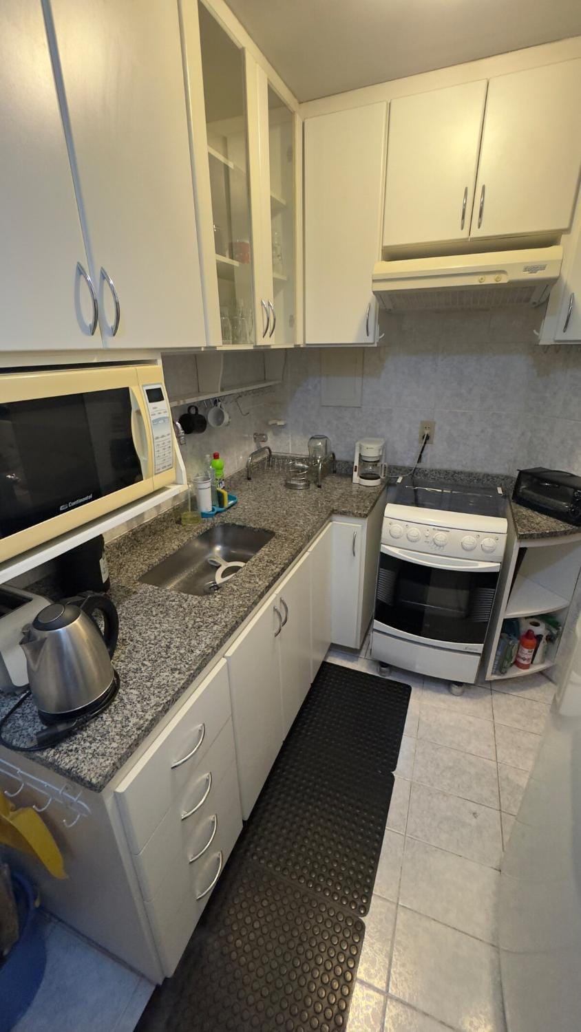Kitchen or kitchenette, oven, toaster
