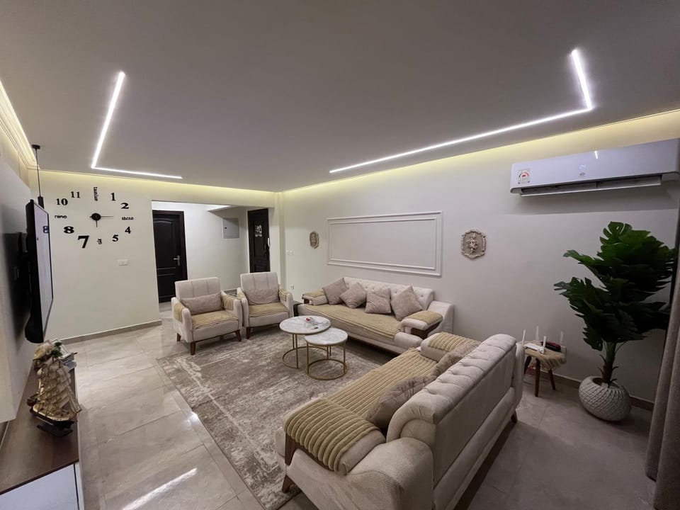 A serviced three - bedroom apartment exclusively for you, located in one of the best areas in Sheikh Zayed Apartment in Egypt