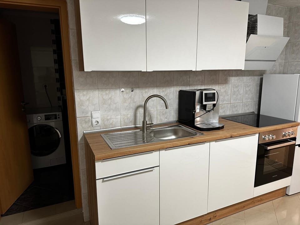 Kitchen or kitchenette, stove, kitchen