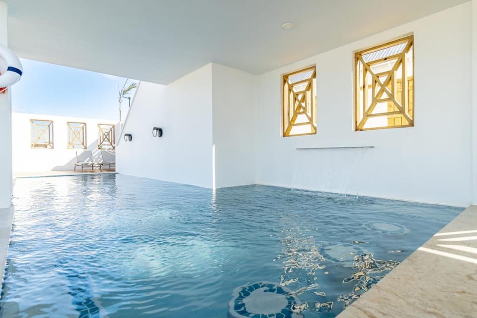 Onda Belize & Mistico Beach Club + Boat Shuttle House in Corozal District