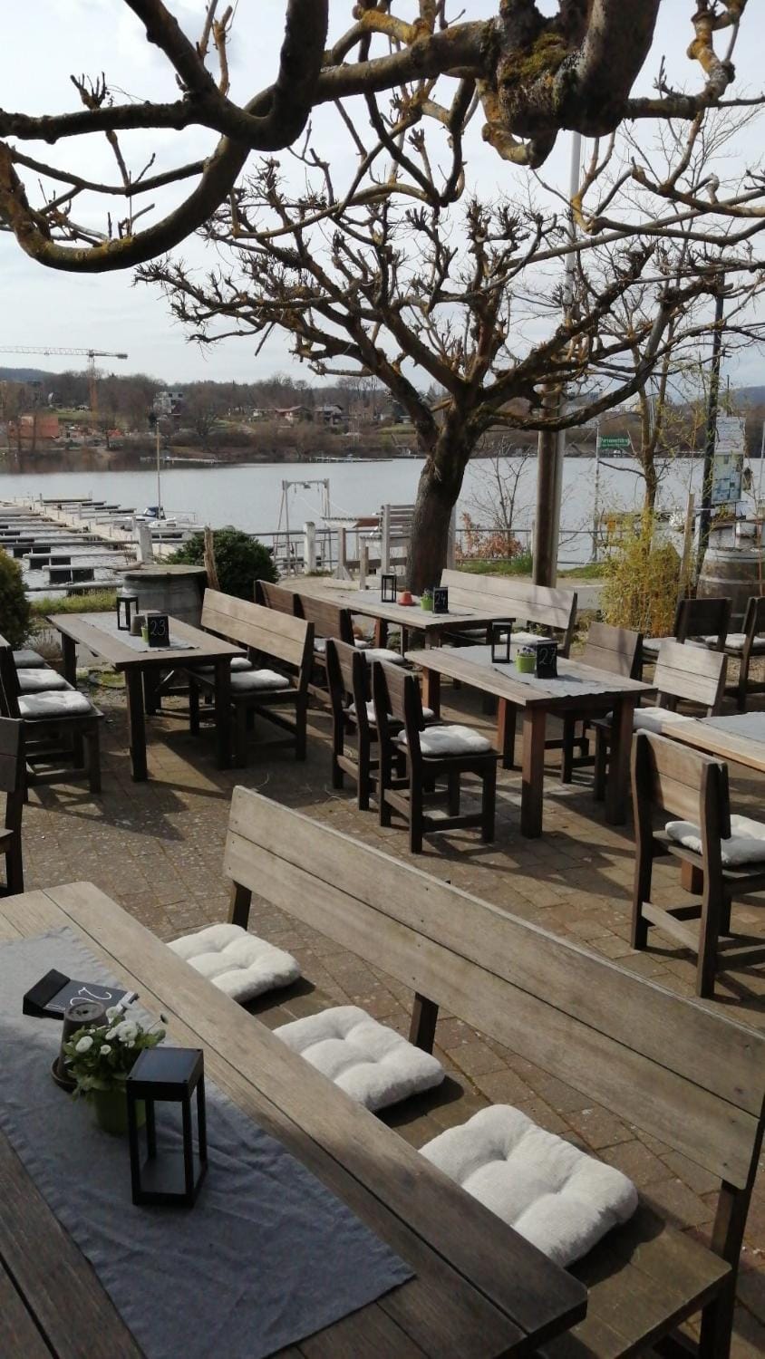 Property building, Restaurant/places to eat, Restaurant/places to eat, Seating area, Lake view