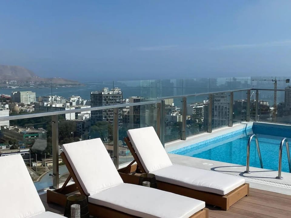 Swimming pool, sunbed