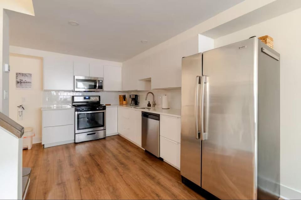 Kitchen or kitchenette, dishwasher, oven, stove, toaster