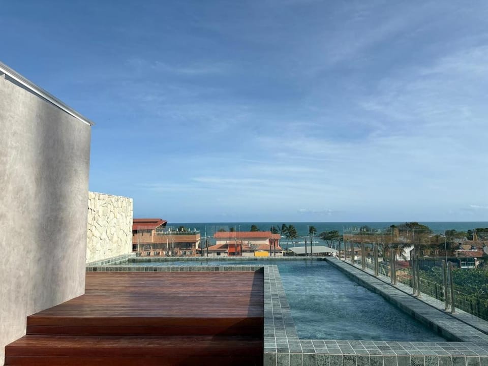 New apartment 60m from the beach Rooftop with pool Apartment in Marechal Deodoro