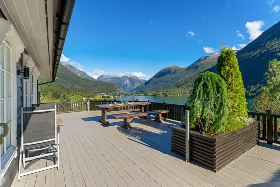 Property building, Patio, Nearby landmark, Spring, Day, Natural landscape, View (from property/room), Balcony/Terrace, Dining area, Lake view, Mountain view, River view