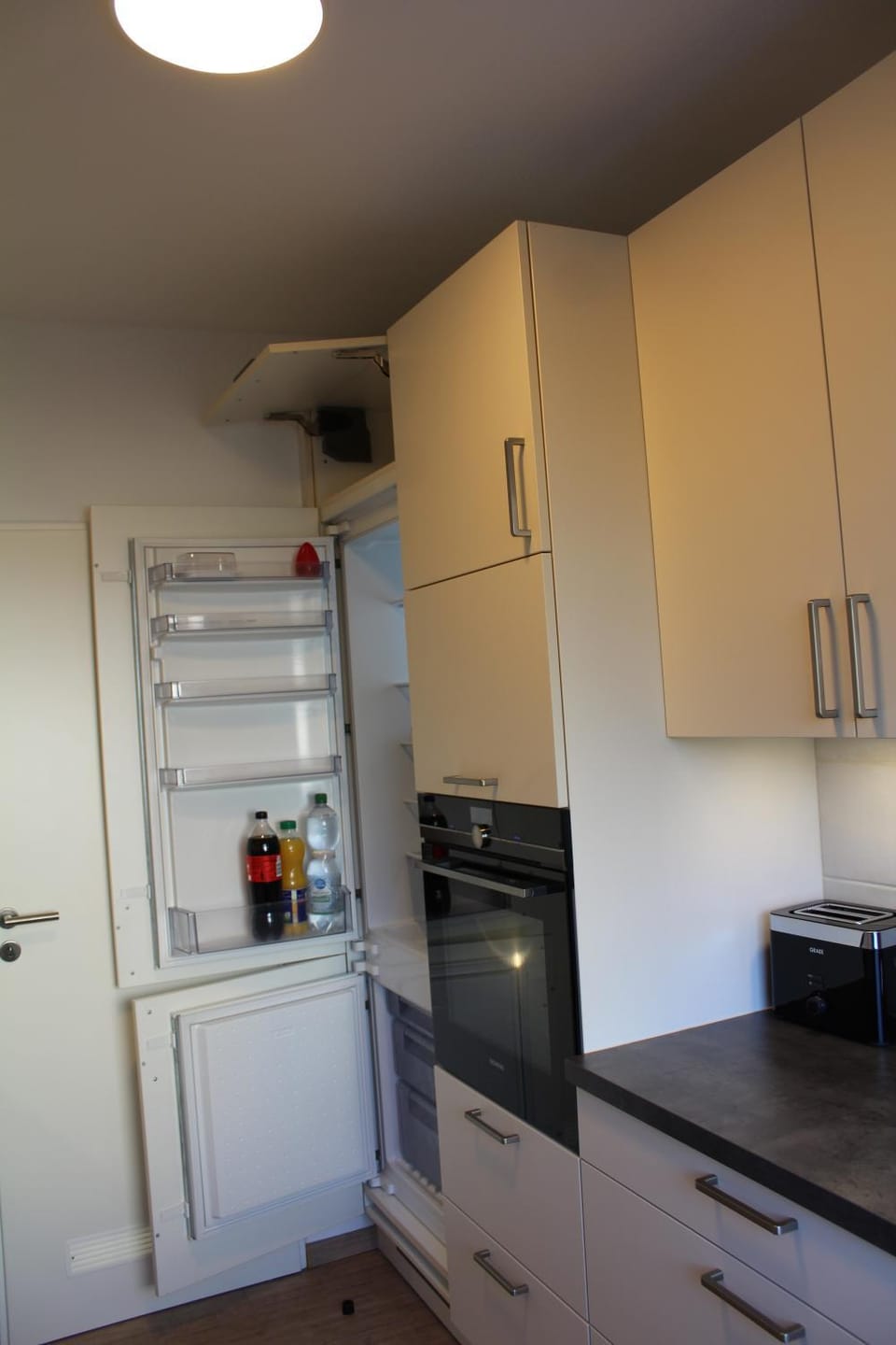 Kitchen or kitchenette, oven, toaster