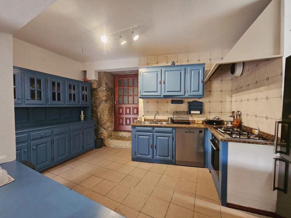 Kitchen or kitchenette, dishwasher, oven, stove, toaster