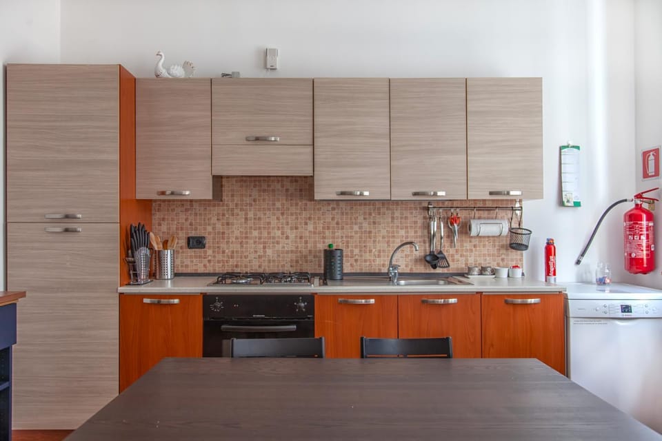 Kitchen or kitchenette, dishwasher, stove