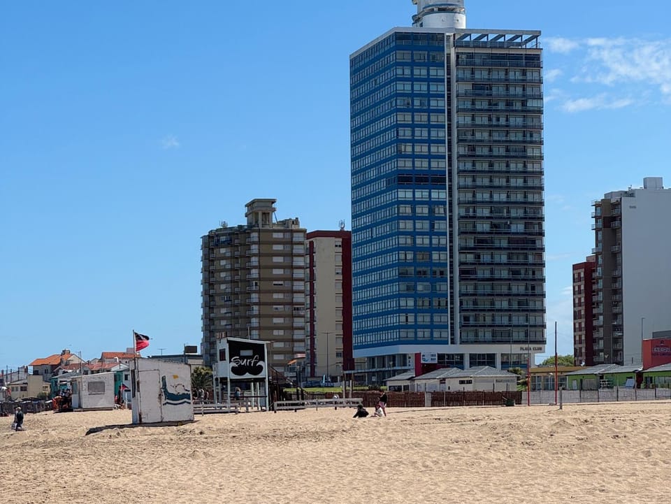 Property building, Off site, Day, Beach, City view