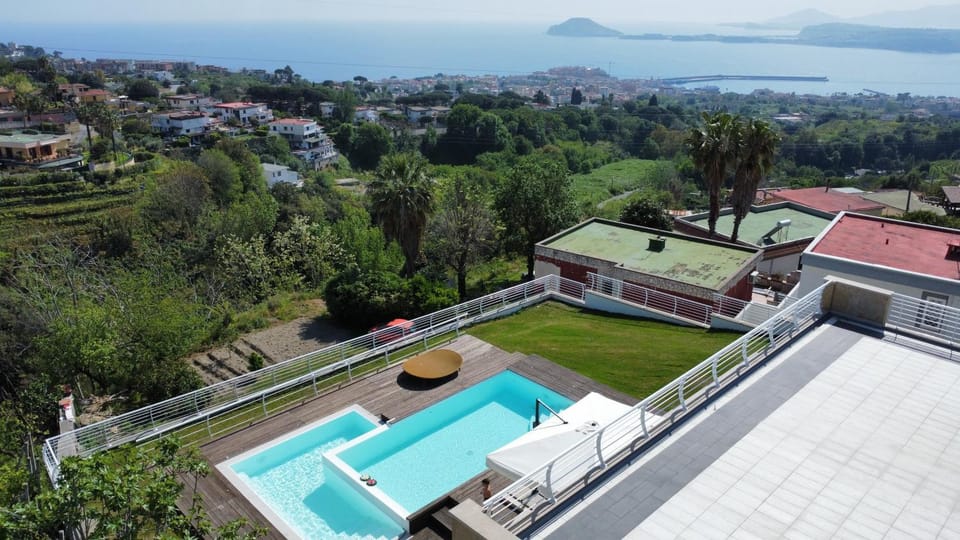 Property building, Patio, Natural landscape, View (from property/room), Balcony/Terrace, Pool view, Sea view, Swimming pool