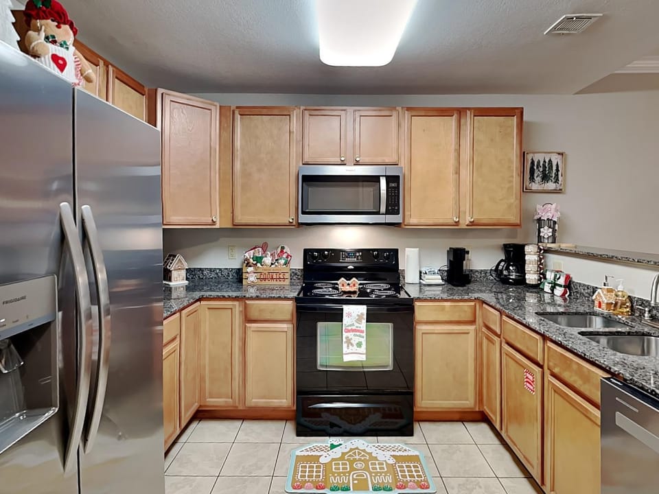 Kitchen or kitchenette, microwave, oven, stove, kitchen, air conditioner