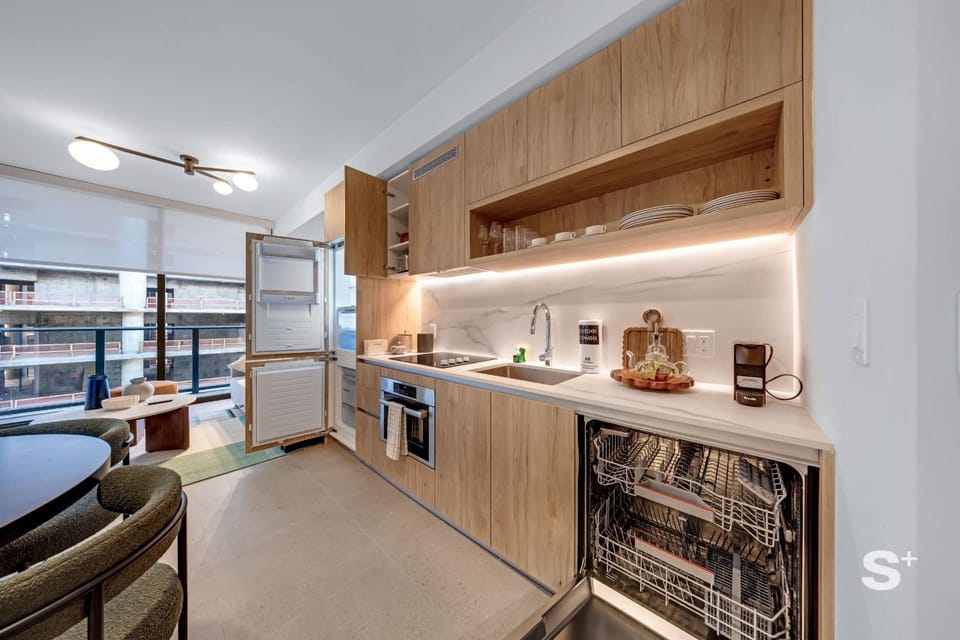 Kitchen or kitchenette, dishwasher, oven, stove