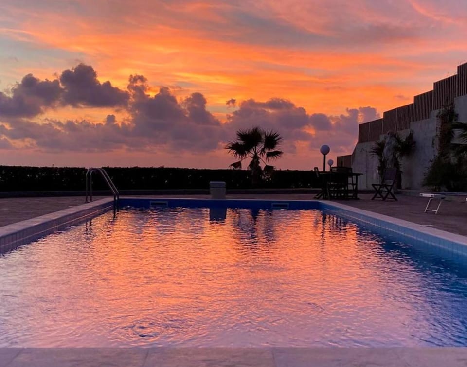 Natural landscape, Pool view, Swimming pool, Sunset, sunbed
