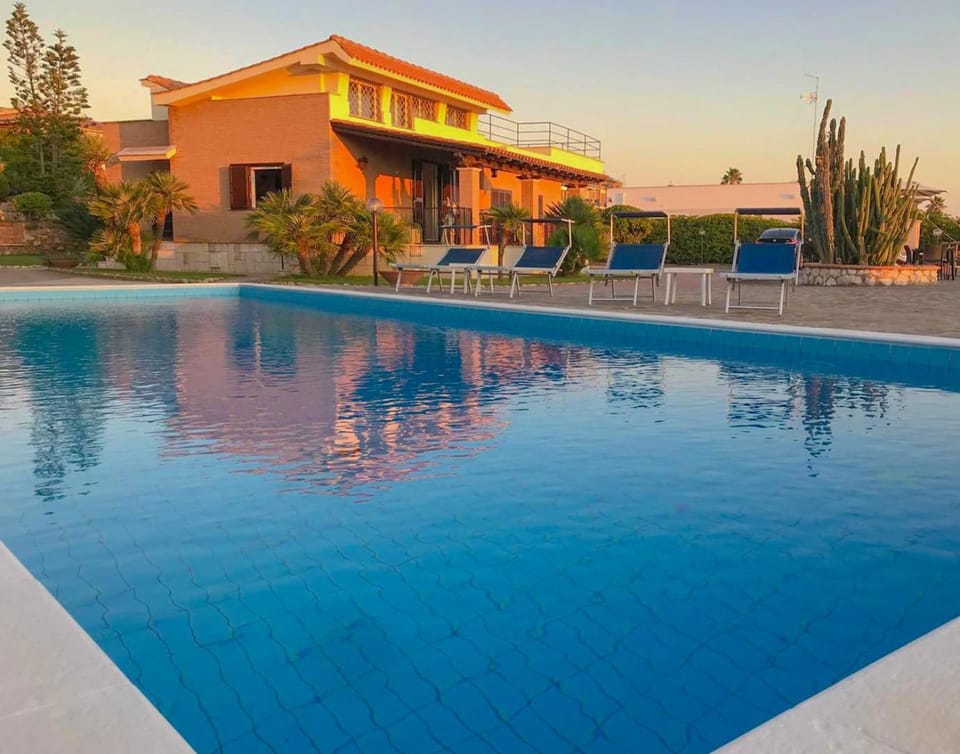 Property building, Pool view, Swimming pool, sunbed